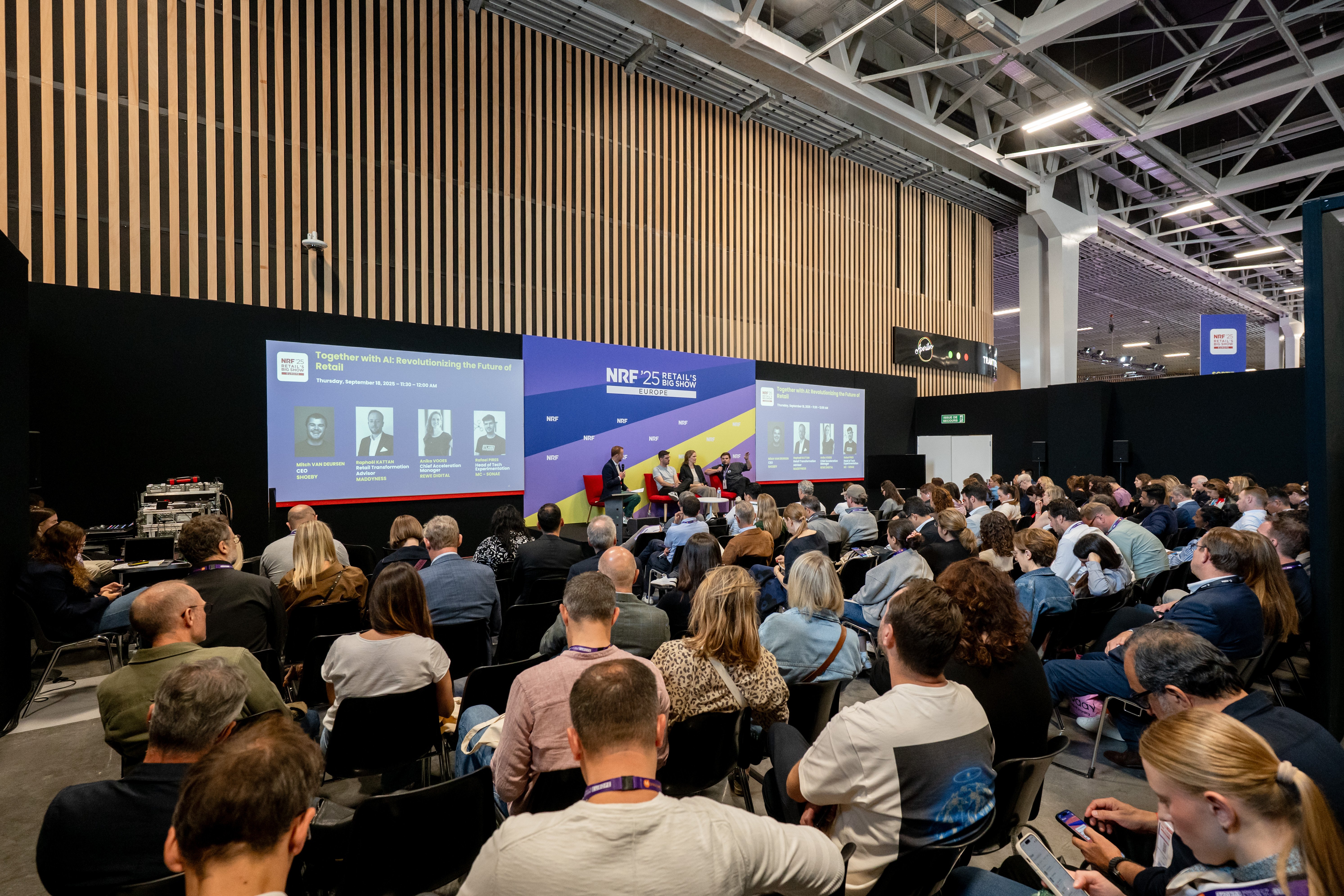 Attendees watching a conference session at NRF 2026: Retail’s Big Show Europe