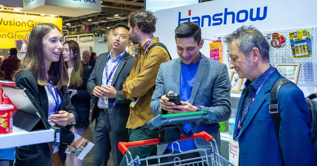 Retail professionals discovering a technology demonstration at NRF 2026: Retail’s Big Show Europe
